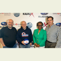 Scott Henrichsen with British Swim School of Gwinnett-Hall and Victoria Archable with CarePatrol Metro Atlanta