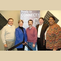 Fontaine Huey with Center for the Visually Impaired, Walter Biscardi with Biscardi Creative Media and Brad Rainey with Golden Key International Honour Society