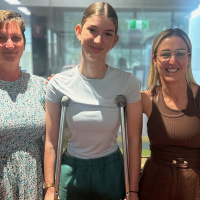 Darwin dancer Monique Dries and mother Rebecca Davis are speaking out after waiting six hours for an ambulance on Saturday night after Monique dislocated her knee during a competition, saying more funding is needed to address the pressures on St Johns and