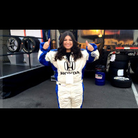June 26, 2015: Jackie Rides an IndyCar With Mario Andretti