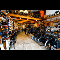 Bicycle hub employing the homeless