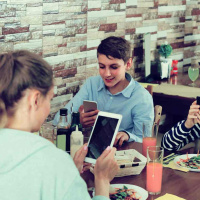 Three quarters of families admit to having their phones at the dinner table