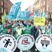 School secretaries and caretakers begin indefinite strike action