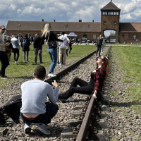 Son of Holocaust survivor condemns ‘shocking’ picture of woman posing at Auschwitz