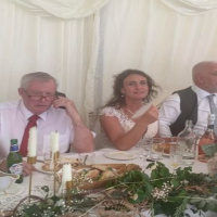 Father of the bride delays wedding speeches to listen to the Kerry game