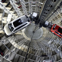 Why are carmakers investing in taxi apps?