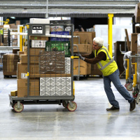 Amazon adds to pay boost to address backlash