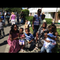 The Kamya family wait for the torch in #Mitcham.