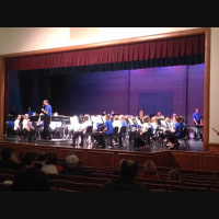 MMS and MHS bands play school song together. 