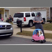 Trooper takes time for photo op with girl in plastic 