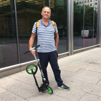 1934: Chatting with @AlekL about his scooter commute.