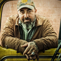 AARON LEWIS ON RECORDING AND FOLDED FLAG