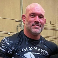 Catch Wrestling, Guard work, and Dominick Cruzs brilliance with MMA Coach Neil Melanson