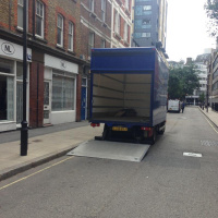 Robin Cooper watches a lorry reversing