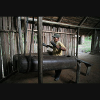Drumming Beats Speech for Distant Communication