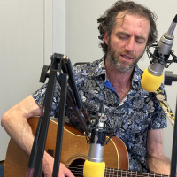 Victor Tyrrell sings on the Justin Macartney show on Belfast 89 FM Radio