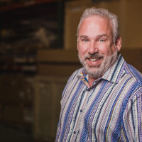 Eric Burg with Apple Rock