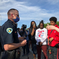 Madison Acting Police Chief Wahl talks with protestors