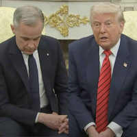 Carney Sits Quietly Like a Good Boy