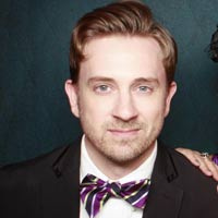 Tom Lenk celebrates the Holidays