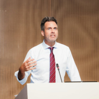 76. International Relocation and Driving Impact: A Look Inside AIIB with Scott Fitzgerald