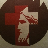 Jesus is taken down from the cross and laid in the tomb