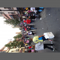 Street sellers screaming to sell their merchandise till the whistling announcing the police