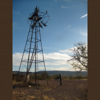 A windmill is squeaking alone in the desert (USA, Arizona)