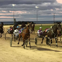 Burnie Harness Racing Club Justine Keay chats to Andrew Kuuse re Sundays Cup meeting at their scenic oceanside track