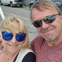 Norm  Treana Rudock selling Nipawin stations CJNE-FM and CITJ-FM