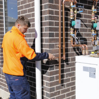 Why arent more buildings heated using geothermal energy?