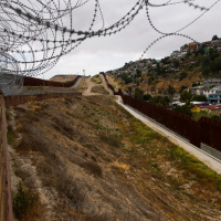 Migrants Desperately Seek Asylum at San Diego-Tijuana Border