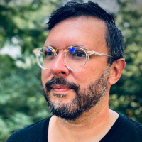 Bringing Voices to the Table for DesignOps with Jay Bustamante