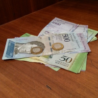 Venezuelas Hyperinflation Crisis and Currency Devaluation Lops Five Zeros Off The Value of Money