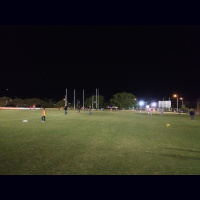 Fans kicking footies on the fan ground before the match