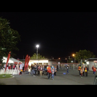 Fans walking through the turnstiles against St Kilda