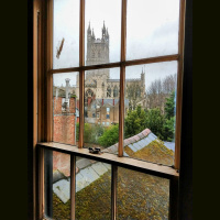 Gloucester Cathedral bells from inside the antiques market