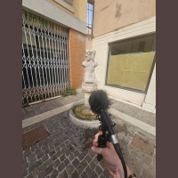 Microphone moving around the fountain