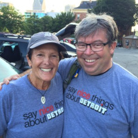 Emily T Gail talks story with Randy Repicky Slow Roll Detroit Squad member 