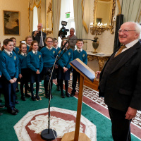 President Higgins addresses 4th class pupils from Gaelscoil Eiscir Riada