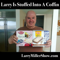 Larry Is Stuffed Into A Coffin