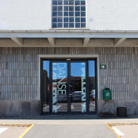 2. Sunglasses and Clogs