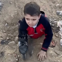 Meditations On A Six Year-Old Amputee Crawling Through Gaza With The Help Of A Roller Skate