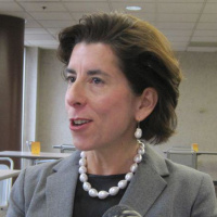 Governor Gina Raimondo talks with reporters