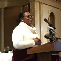 Phionna Claude offers a poem: “I Choose Love” at RI Ministers Alliance MLK breakfast