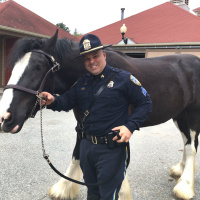 Sgt. Steven Courville, Terry Moran  Mayor Jorge Elorza - Horses are donated to the Providence Police