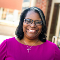 Neighborhood Development Center President Renay Dossman