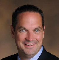 Dr. John Flanery of Heelan Catholic Schools and the Missouri River Choral Society 