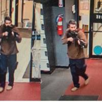 1 whiteman with a gun