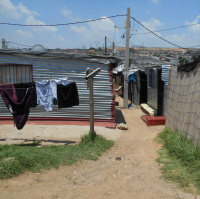 Dark Clouds over Informal Settlements I: Politics of Land and Infrastructure